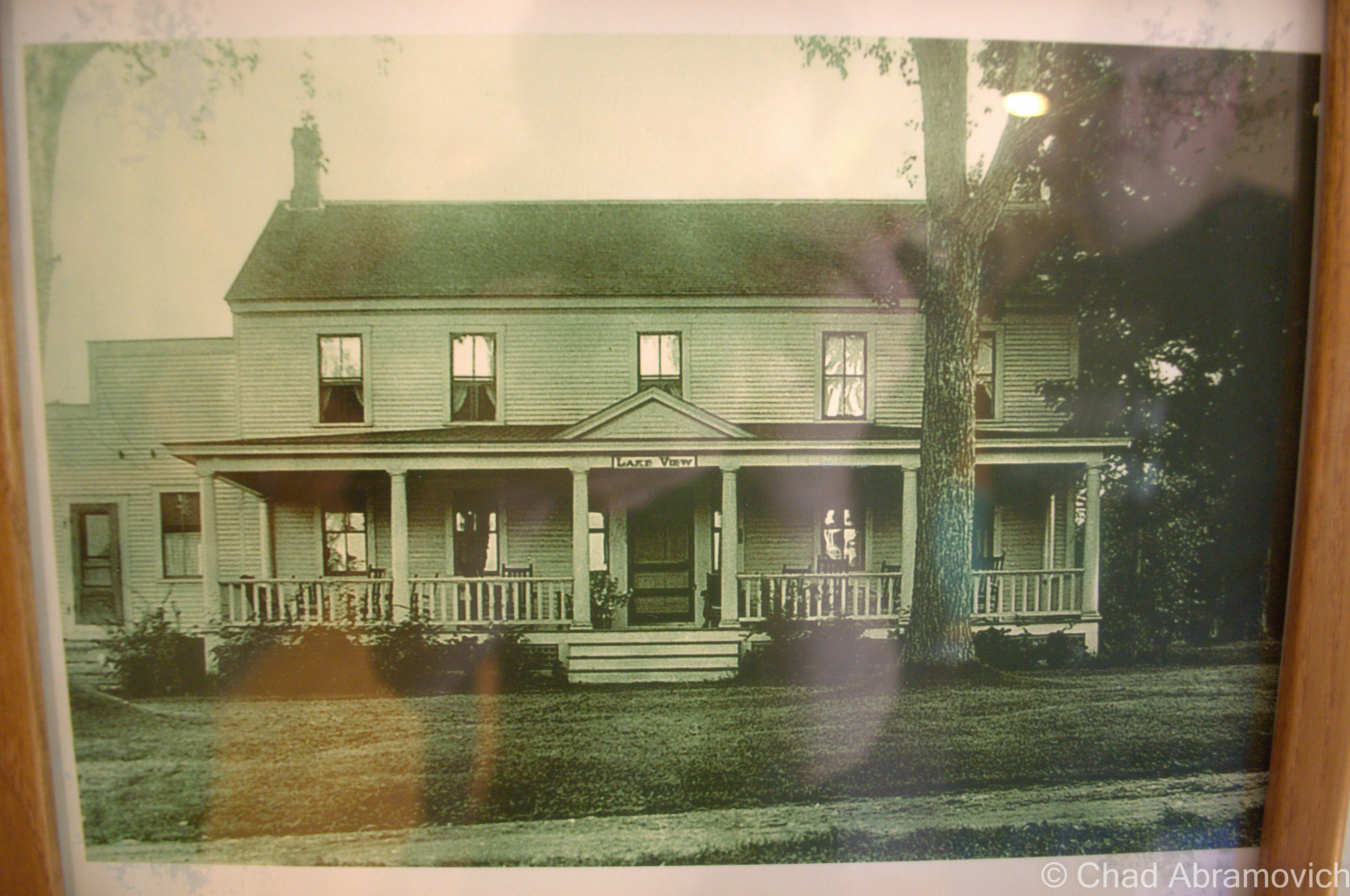 An original picture of the Eddy Brothers Farmhouse. (I think circa 1920-1930). Notice the name “Lake View” above the porch? The Eddy Brothers Farmhouse used to be surrounded by a beautiful pond, the house sitting on a peninsula in the middle. Older photos of the farm show the barns sitting across the bays of the pond with the house in the foreground. However, In the early 1900s, the beaver dam burst, and within hours, the pond had drained. Today, the ravine where the former pond was can still be traced, now filled in with younger growth trees and countless berry bushes.