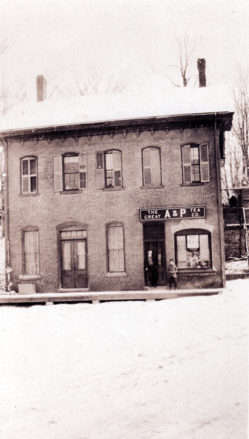 Joseph Clark's Office Building on the corner of RIver St (Route 7) and Main. Milton denizens today may recall it by it's former reincarnation, as Irish Annie's Pub.