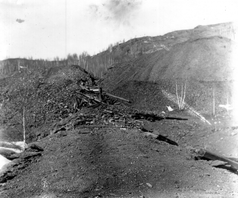 This photo from 1860 shows the extensive pollution from the mining operations; a wasteland of tailings piles, slag and wood scraps from older mine structures. | UVM Landscape Change Program